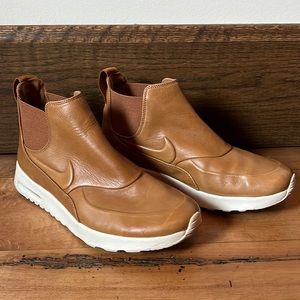 Nike brown leather slip one with nike swoosh detailing